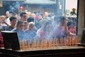 CANTON, CHINA Ã¢â¬â CIRCA FEBRUARY 2019: The crowd of people praying in the taoist temple during the Chinese New Year.